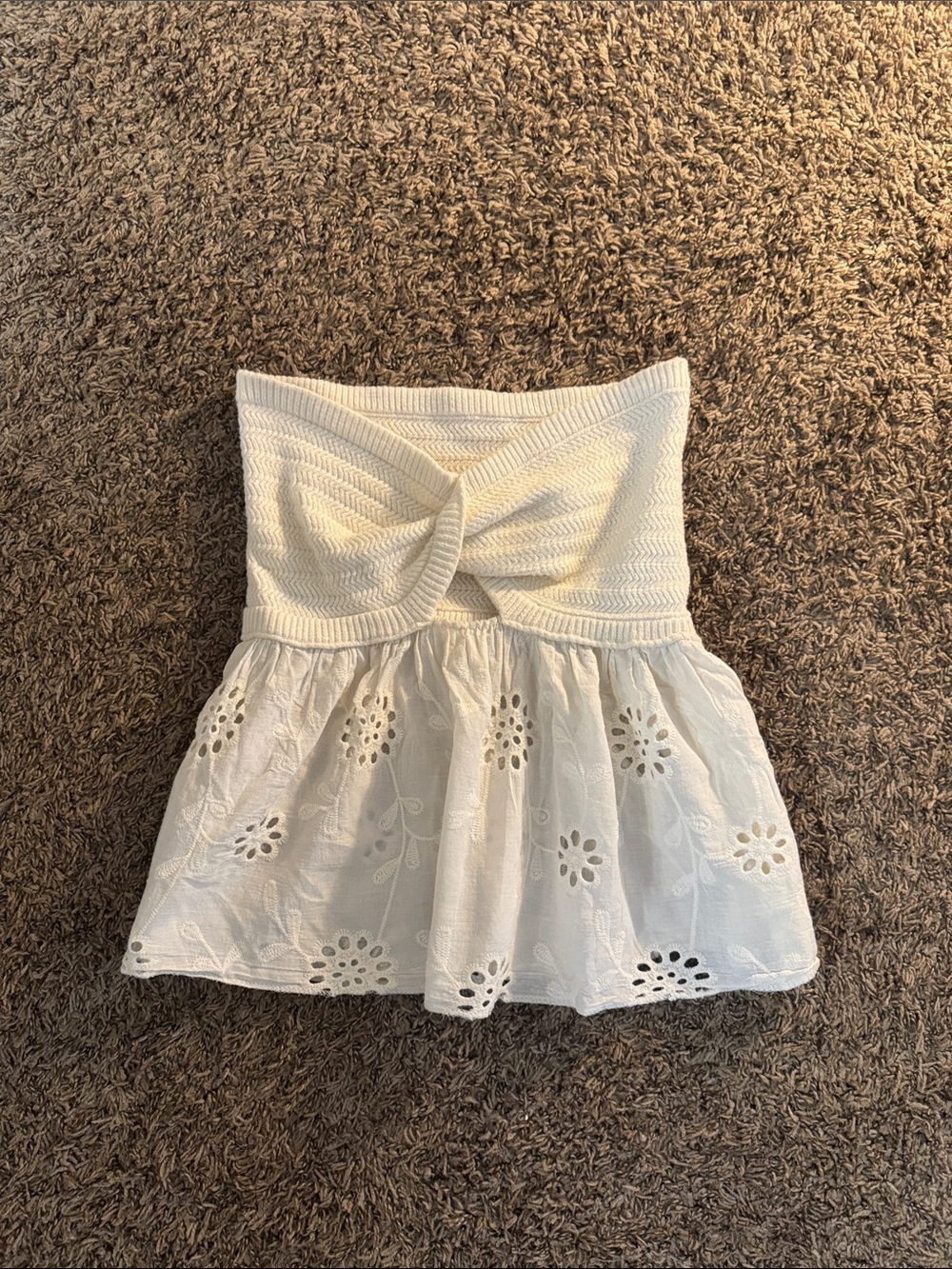 Eyelet top with cute detail
